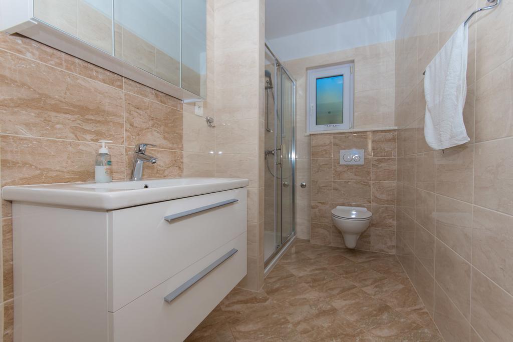 Apartmani Gaube Traù Esterno foto